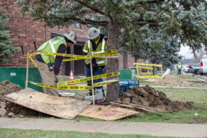 INTREN employees using device to guide and locate borehead in splice pit to make sure shot was at appropriate depth and did not strike any existing utilities.